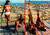 Vintage Italian beach pin up postcard showing sunbathing women on the Riviera della Versilia