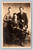 Antique RPPC three men studio portrait seated and standing group