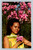 Native girl in field of orchids in Agana, Guam postcard