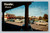 Broad green plaza and centralized business district with shady pergolas in Chandler Arizona