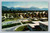Panorama of Patton State Hospital with orange groves and snow capped Mt. San Bernardino