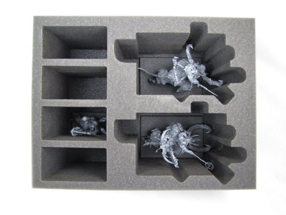 Models pictured are for size comparison only. They are the personal property of Battle Foam employees and are not included with the purchase of this tray. The fit of the models are not endorsed or affiliated with Games Workshop Limited in any way.