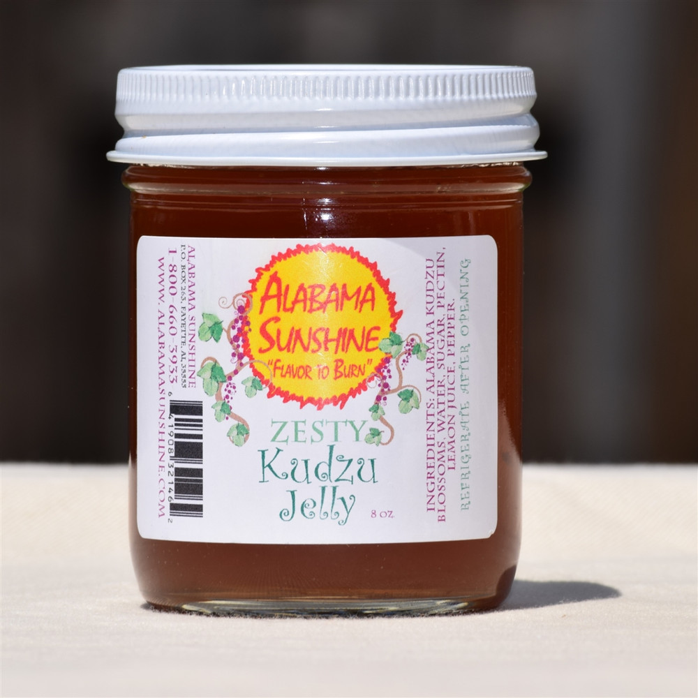 Alabama-made kudzu jelly in glass jar, unique Southern grape-flavored spread made from kudzu blossoms, gourmet gift item