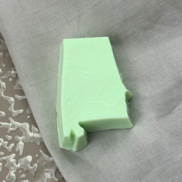 Alabama-shaped kiwi scented shea butter soap handmade in Sheffield. A unique Alabama gift with fresh scents—perfect for souvenirs, hostess gifts, and corporate gifting.