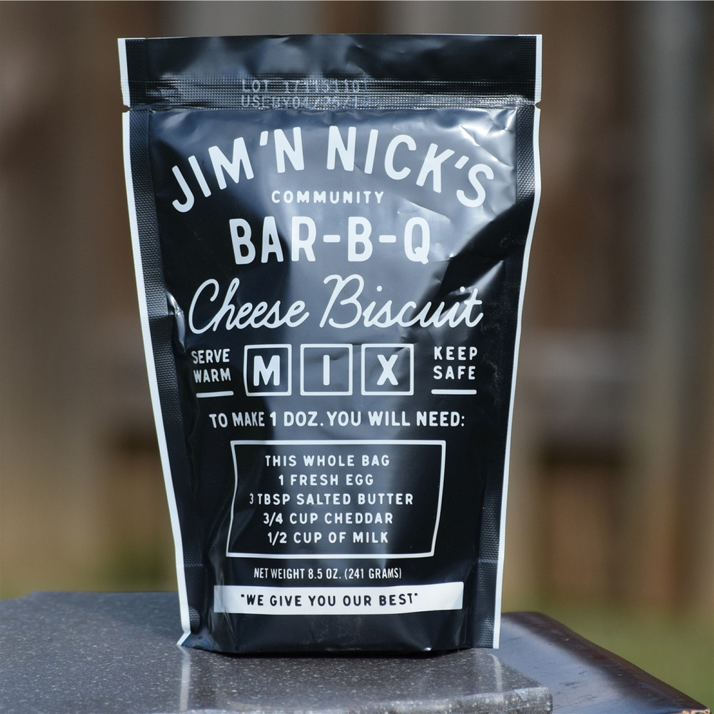 Jim ’N Nick’s Cheese Biscuit Mix packaging, Alabama made biscuit mix, Southern cheese biscuits prepared and baked, cheesy biscuit texture close-up