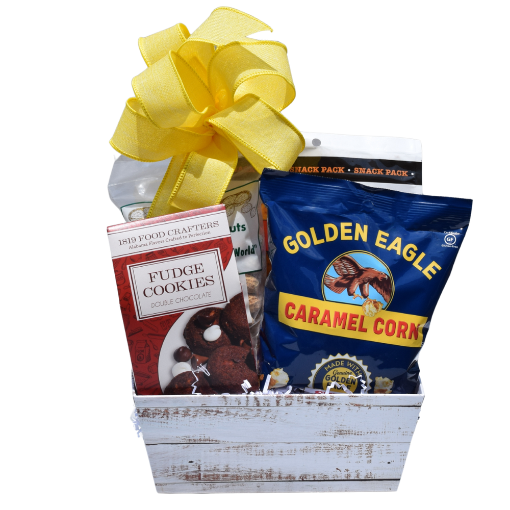 Bite of Alabama snack gift basket with chocolate chip cookies, caramel corn, roasted peanuts, BBQ crackers and a pretty bow.