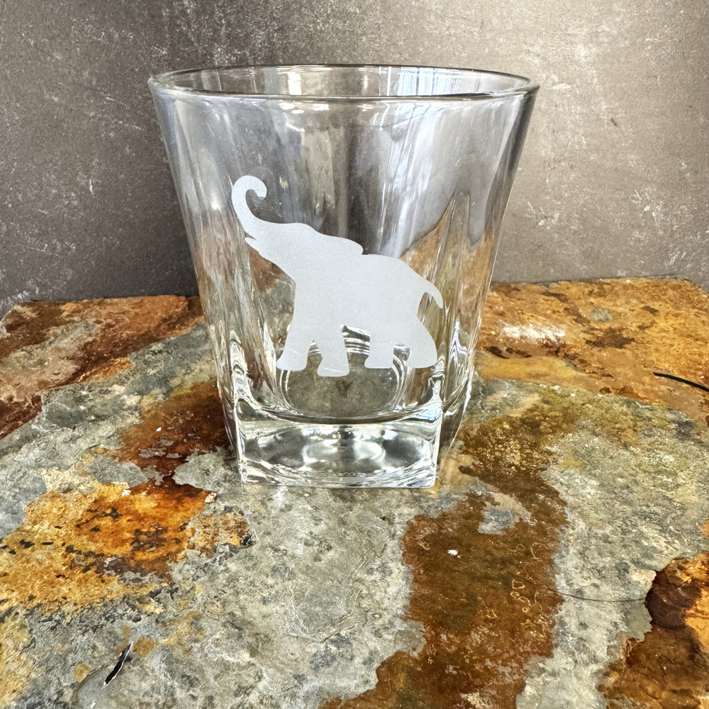 Etched elephant highball glass featuring Alabama-inspired design
