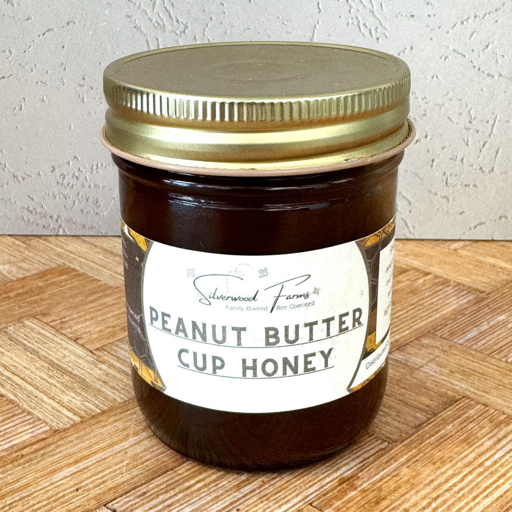Peanut butter cup honey jar spread on toast with drizzle