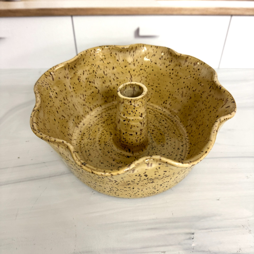 Handcrafted Alabama stoneware quarter pound cake baking dish by June Bug Pottery with scalloped edges and artisan glaze finish