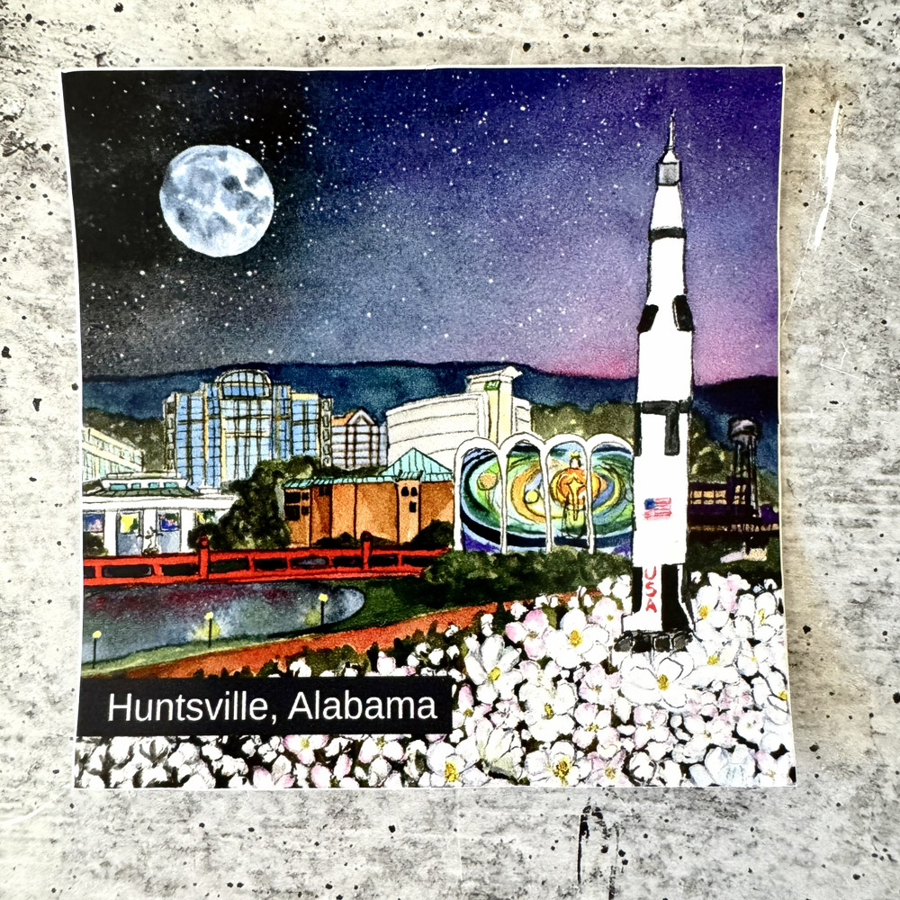 Huntsville Alabama skyline sticker featuring Saturn V rocket under a starry night sky