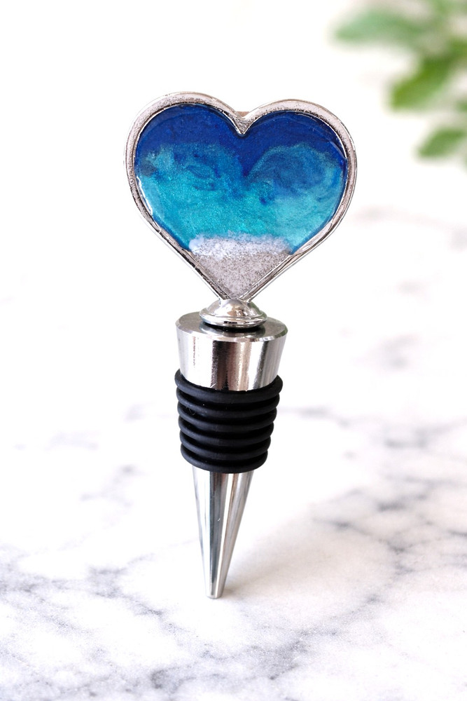 Ocean Heart Wine Bottle Stopper with blue coastal resin art and polished metal base, decorative wine gift for beach lovers and coastal home décor