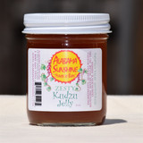 Alabama-made kudzu jelly in glass jar, unique Southern grape-flavored spread made from kudzu blossoms, gourmet gift item