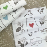 Alabama state icon cotton flour sack towel with heart detail, made in Dothan Alabama, displayed in kitchen setting