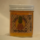 Alabama-made pineapple pepper jam in glass jar, sweet and spicy tropical fruit spread with pepper for cheese boards and gourmet gifts