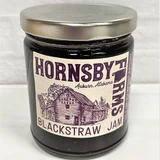 Blackberry strawberry jam in glass jar, Alabama-made Blackstraw jam by Hornsby Farms, gourmet Southern jam for biscuits and toast