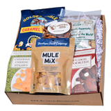 Homegrown Favorites Alabama snack gift box with caramel corn, roasted peanuts, double chocolate cookies, cheese straws, snack mix and praline pecans.