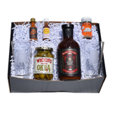 Stir It Up Bloody Mary gift kit with Southern Roots mix, Alabama hot sauces, Cajun seasoning, Wickles pickled okra and two Alabama pint glasses.