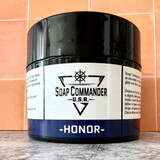 Clean, white shaving soap puck with rich lather, barbershop grooming product made in Alabama