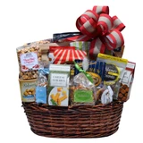 The Signature Alabama gourmet gift basket with popcorn, cookies, cheese straws, snack mixes, nuts, caramels, brittle, crackers, and savory treats in a large wicker basket.