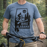 Bike Alabama t-shirt with Alabama state outline filled with mountain biking trail scene, perfect for outdoor enthusiasts and cyclists