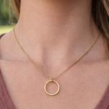 Hammered circle necklace with textured finish
