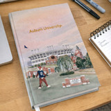 Auburn University hardcover notebook with watercolor campus illustration featuring Jordan-Hare Stadium, Samford Hall, and Aubie mascot