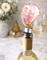 Oyster shell wine stopper with hand-painted floral design and gold edge, handmade in Alabama, coastal wine accessory gift