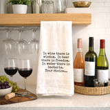Wine Beer Water Funny Tea Towel with humorous quote on neutral cotton kitchen towel, styled in a modern kitchen or bar cart setting