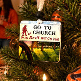 Go to Church or the Devil Will Get You ornament hanging on a Christmas tree, vintage Alabama Christmas ornament, Southern folk art holiday decoration, square Christmas ornament with nostalgic Southern saying