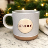 Merry ceramic coffee mug with festive holiday design, speckled handmade-style Christmas mug, cream ceramic mug for coffee, tea, hot cocoa, seasonal gift
