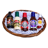 Alabama Sauce Boss BBQ and grilling gift basket with Ollie’s BBQ sauce, Big Bob Gibson white sauce, Sneaky Pete’s sauce, hot sauce and marinade.