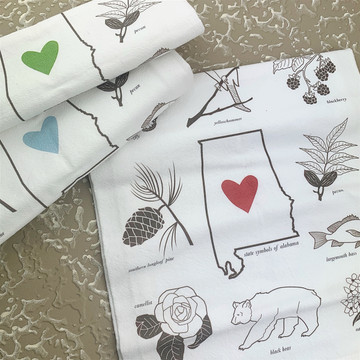 Alabama state icon cotton flour sack towel with heart detail, made in Dothan Alabama, displayed in kitchen setting