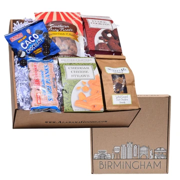 Taste of Birmingham gift box with Birmingham-made cookies, cheese straws, praline pecans and dark chocolate salted caramel granola in a skyline box.