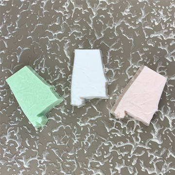 Handmade Alabama-shaped shea butter soap in kiwi cucumber fragrance, artisan crafted in Sheffield, Alabama, for gifts, guest baths, and Southern gift baskets.