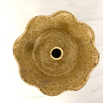 Handcrafted Alabama stoneware quarter pound cake baking dish by June Bug Pottery with scalloped edges and artisan glaze finish