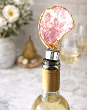 Oyster shell wine stopper with hand-painted floral design and gold edge, handmade in Alabama, coastal wine accessory gift