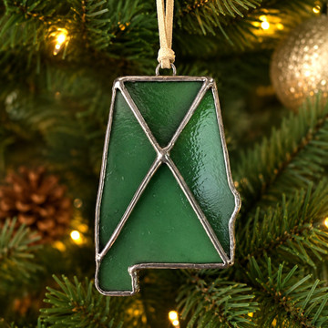 Alabama-shaped stained glass Christmas ornament handcrafted in amber or green glass with leaded solder and suede hanger, handmade in Alabama.