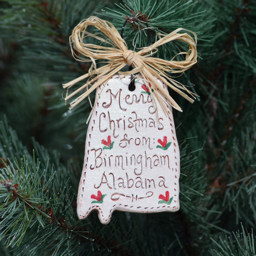 Christmas ornament featuring “Merry Christmas from Birmingham” text, festive Alabama holiday ornament, Birmingham souvenir ornament hanging on tree