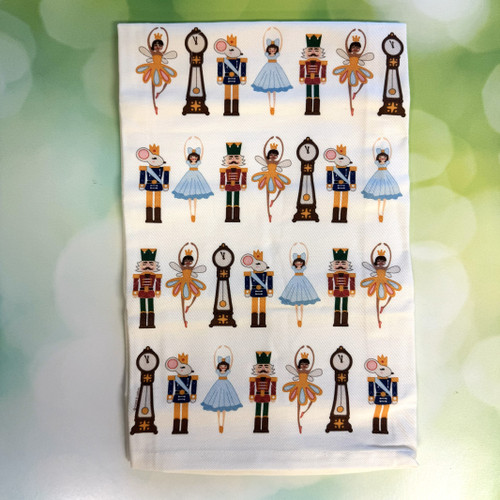 Nutcracker holiday kitchen towel in organic cotton with festive character print displayed in a styled kitchen setting