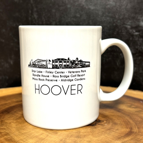 Hoover Alabama city skyline mug with illustrated landmarks including Moss Rock Preserve, Ross Bridge, Aldridge Gardens on ceramic coffee mug