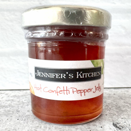 Hot Confetti Pepper Jelly mini jar – sweet and spicy Alabama-made pepper jelly in a small glass jar, perfect for gifts, party favors, charcuterie boards, and entertaining