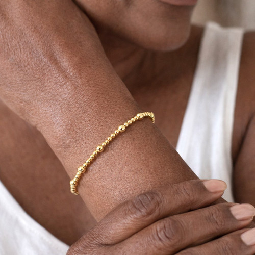 Beaded stretch gold bracelet versatile and beautiful