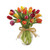 20 fresh cut tulips in a clear vase with a raffia ribbon.