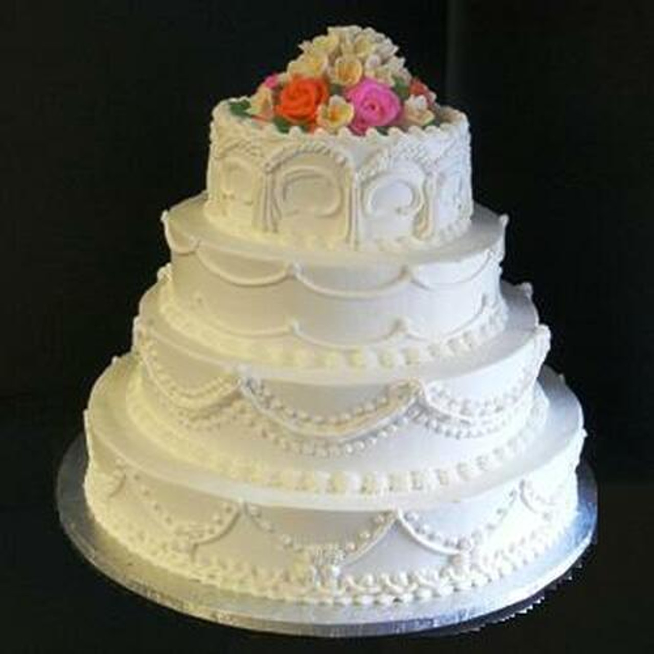 Beautiful 4 tier wedding cake featuring mixed designs and double ribbons on  each tier - Picture of Cakes For All Occasions, Templeton - Tripadvisor