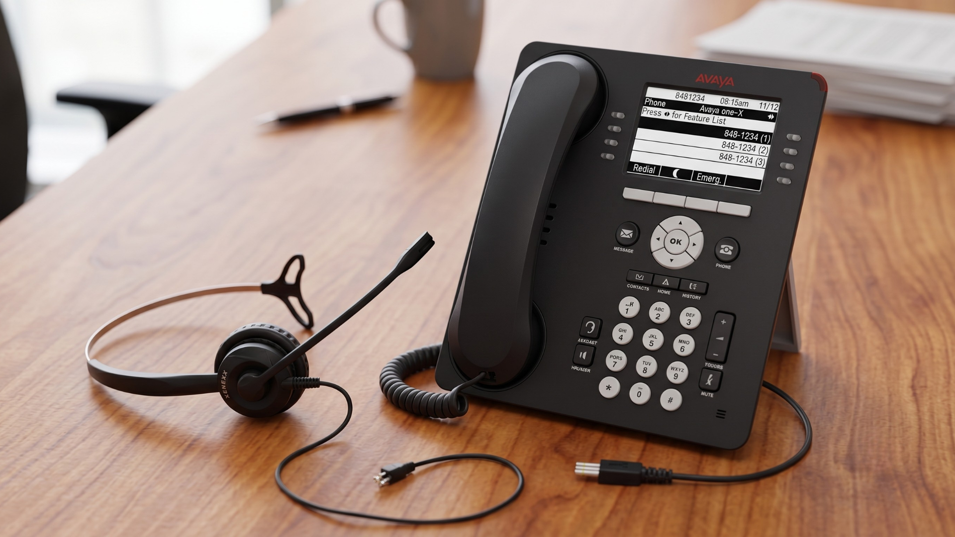 Xenexx XS820 wired headset beside an Avaya IP Office desk phone
