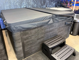 Core Series hot tub with black canvas cover closed