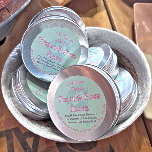 Tins filled with Tulsi Rose Salve