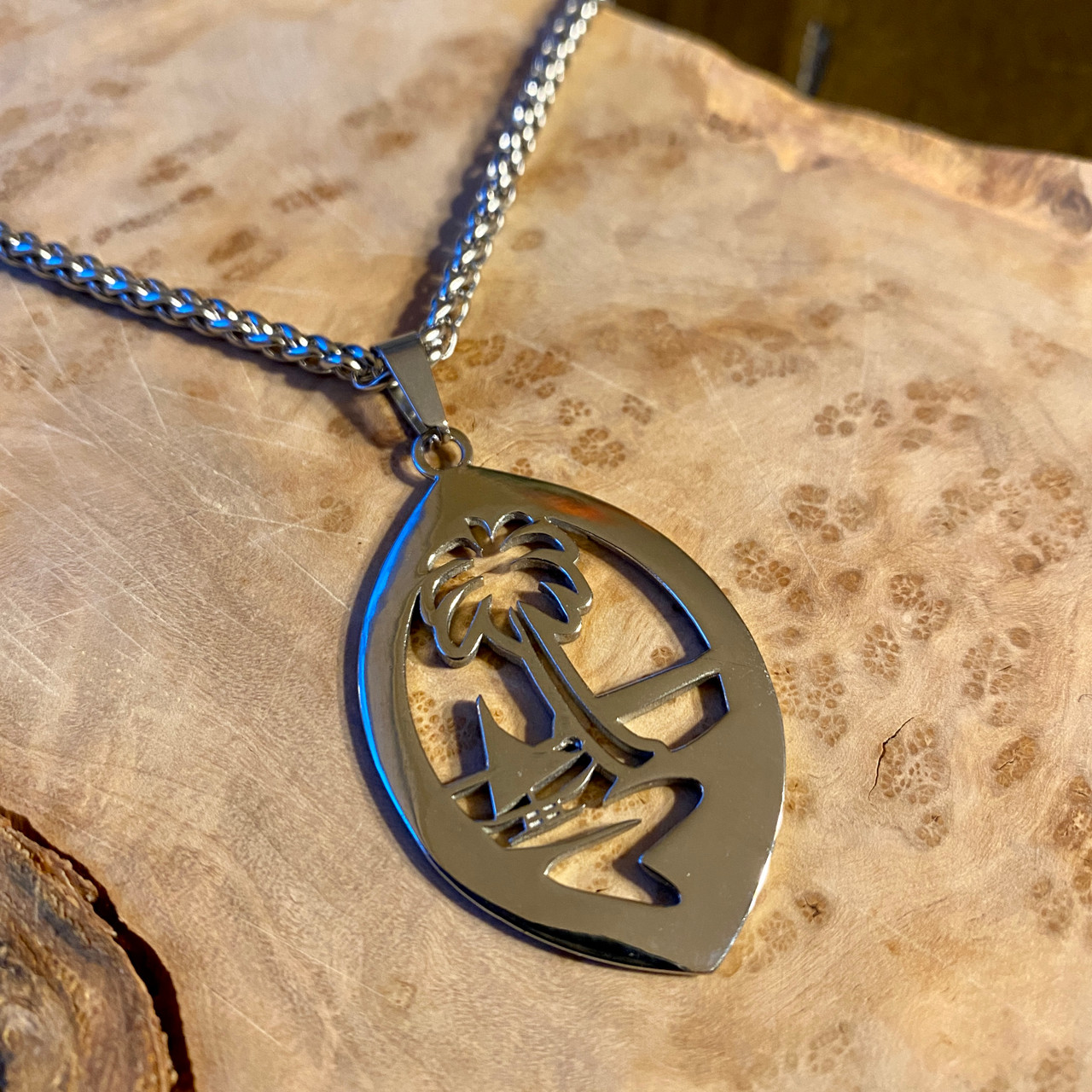 Stainless Steel Modern Guam Seal Pendant And Braid Necklace Stainless Steel Modern Guam Seal Pendant And Braid Necklace