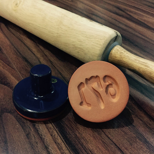 new-guam-area-code-671-ceramic-stamp-2-round-gerard-aflague