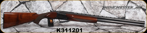 Consign - Winchester - 12Ga/2.75"/28" - Model 101 Field - Grade III Walnut Stock w/Semi-Beavertail Forend/Engraved Receiver/Blued Finish, F/M fixed chokes - in original box w/papers - small crack behind the tang(pictured)